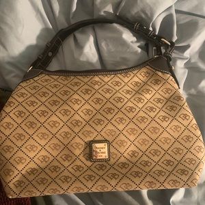 Dooney and Bourke hand bag. Used a couple times. Still in fairly new condition
